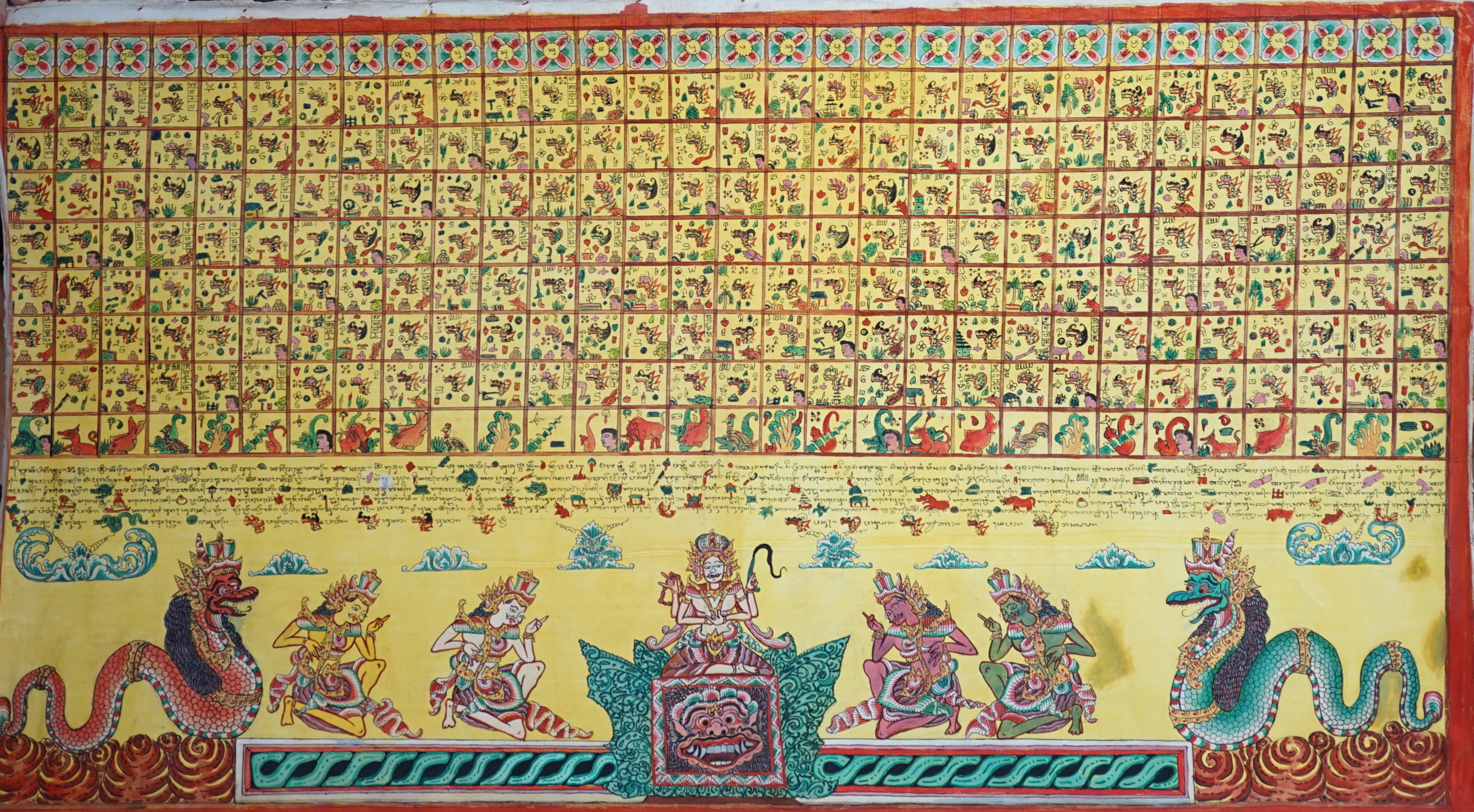 An Indonesian hand painted calendar and two similar figures, tallest 21cm